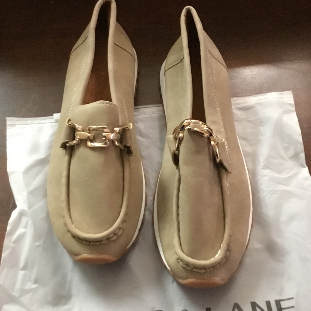 Balenciaga Beige Loafers with Gold Accent